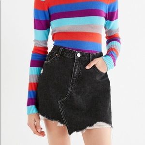 Asymmetrical distressed black jean skirt